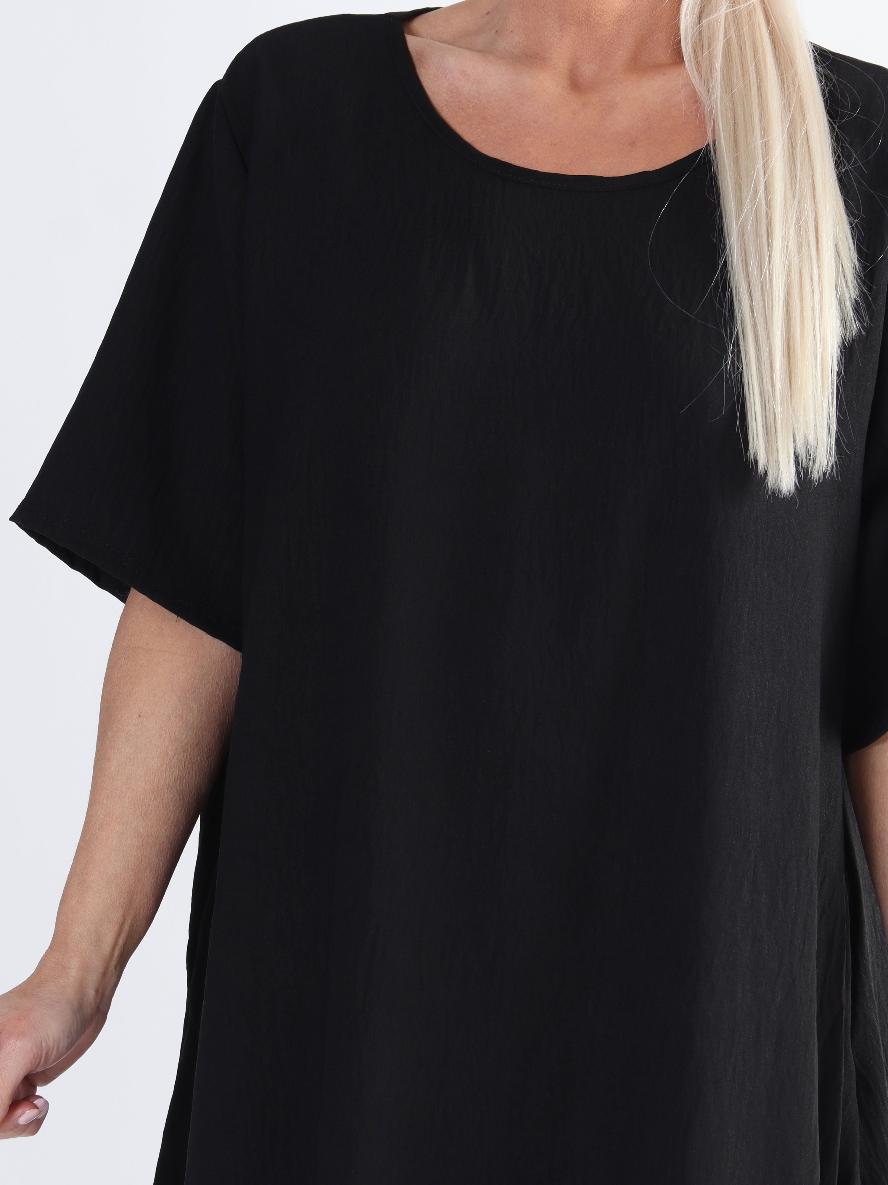 Emmelie - Klänning i viskosblandning med fickor i plus size.